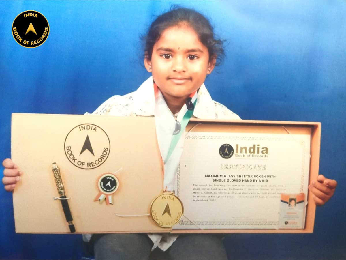 Maximum glass sheets broken with single gloved hand by a kid IBR