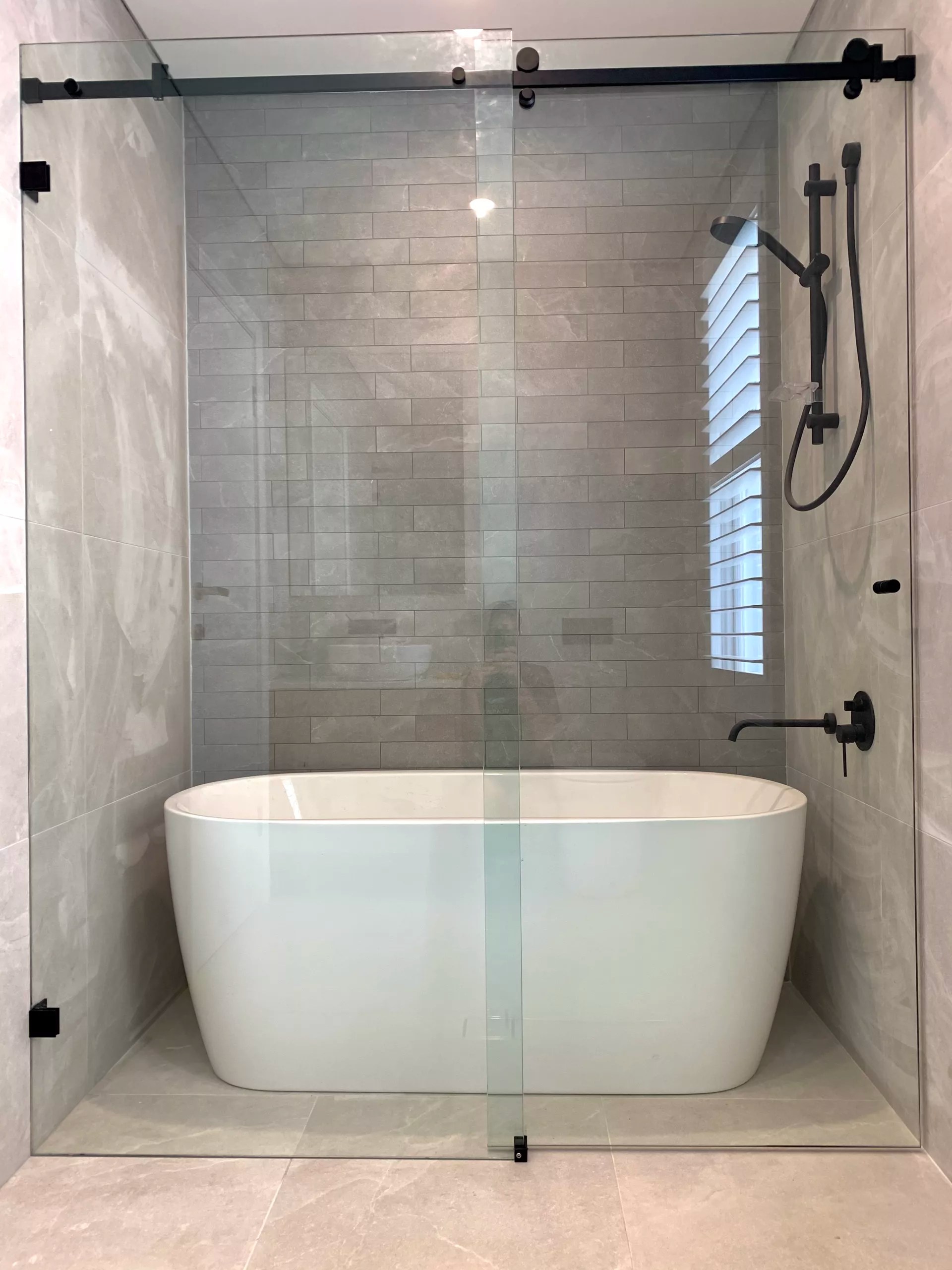 Frameless Corner Shower Screen Sydney › Infinity Glass Sydney