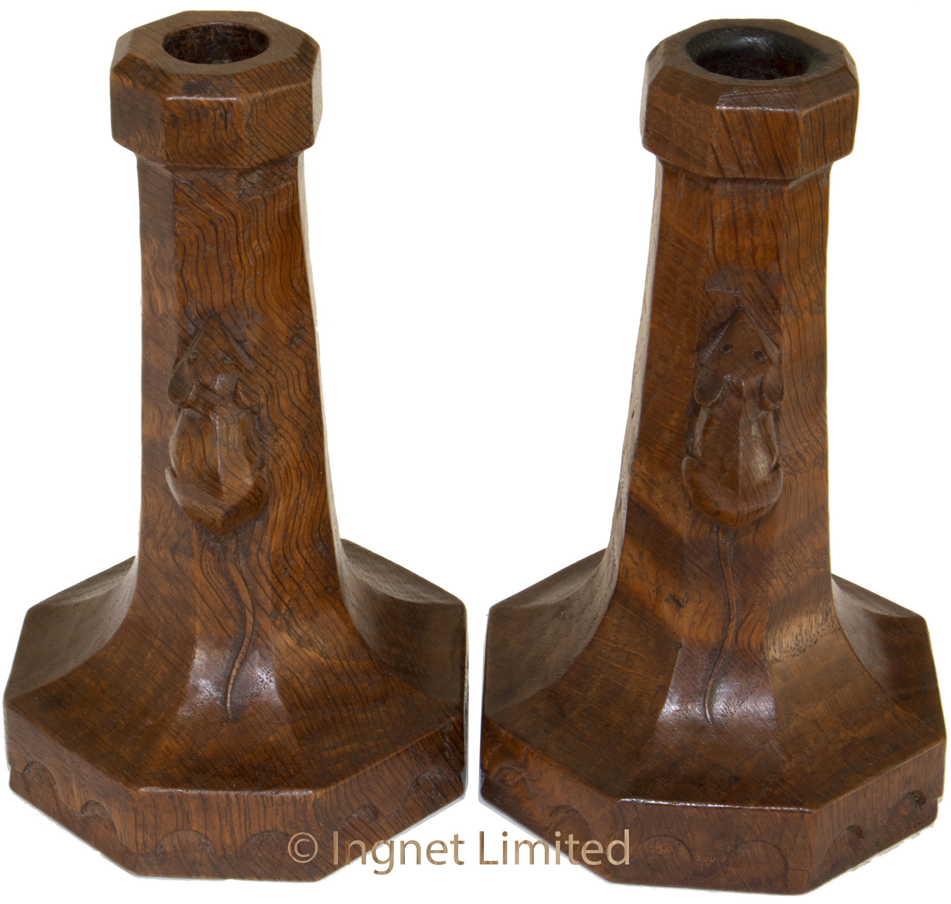 A PAIR OF ROBERT MOUSEMAN THOMPSON CASTELLATED BASE CANDLESTICKS