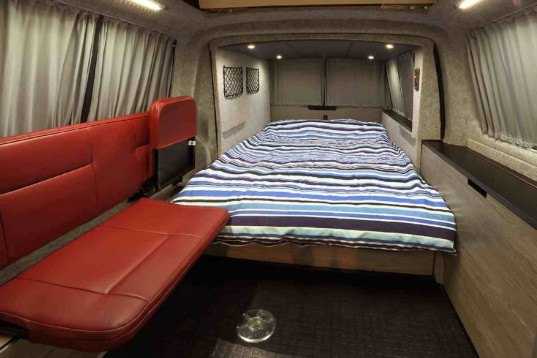 Doubleback camper van extends 6.5 feet with the press of a