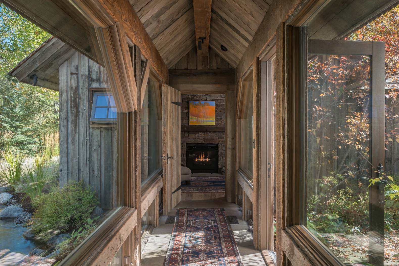 Architects create exquisite home addition out of reclaimed barn wood
