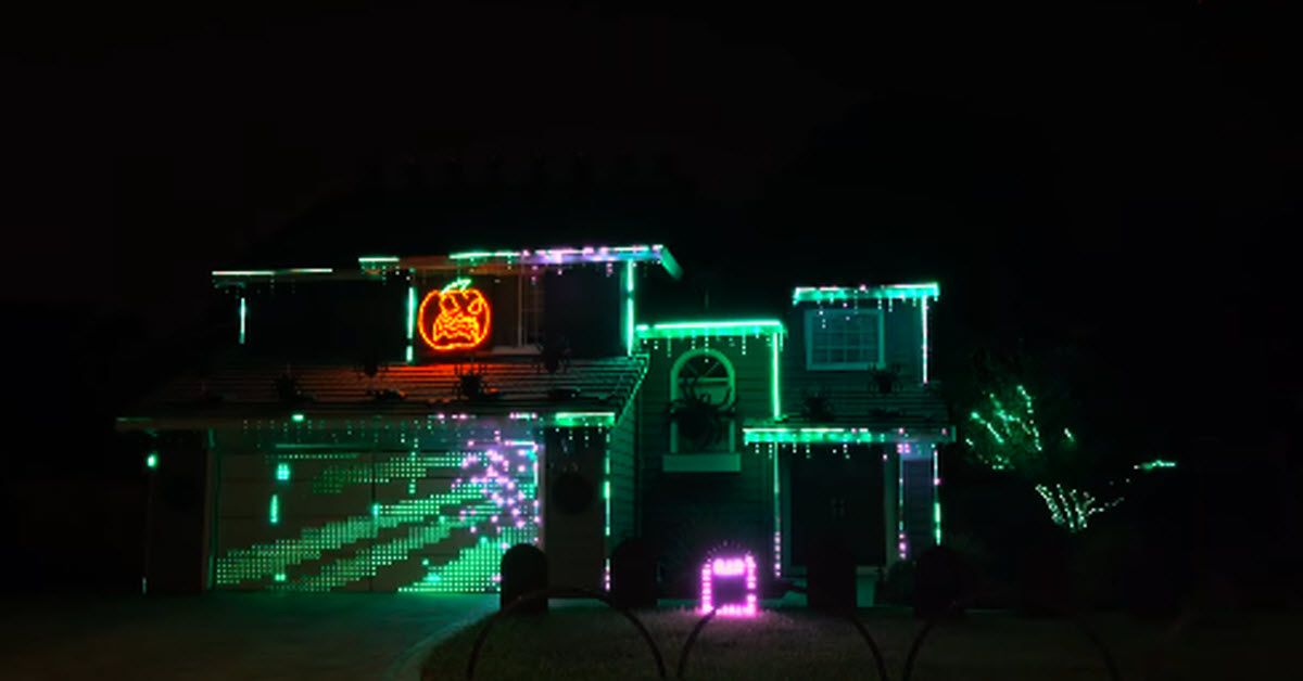 A Spooky Halloween Light Show With Pumpkin Singing ‘Enter Sandman’ By