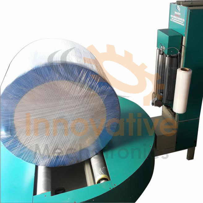 Paper Roll Reel Stretch Wrapping Machines Manufacturer & Exporter