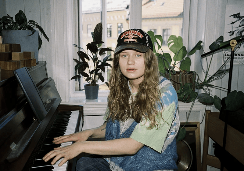 Girl In Red Inside Seaside