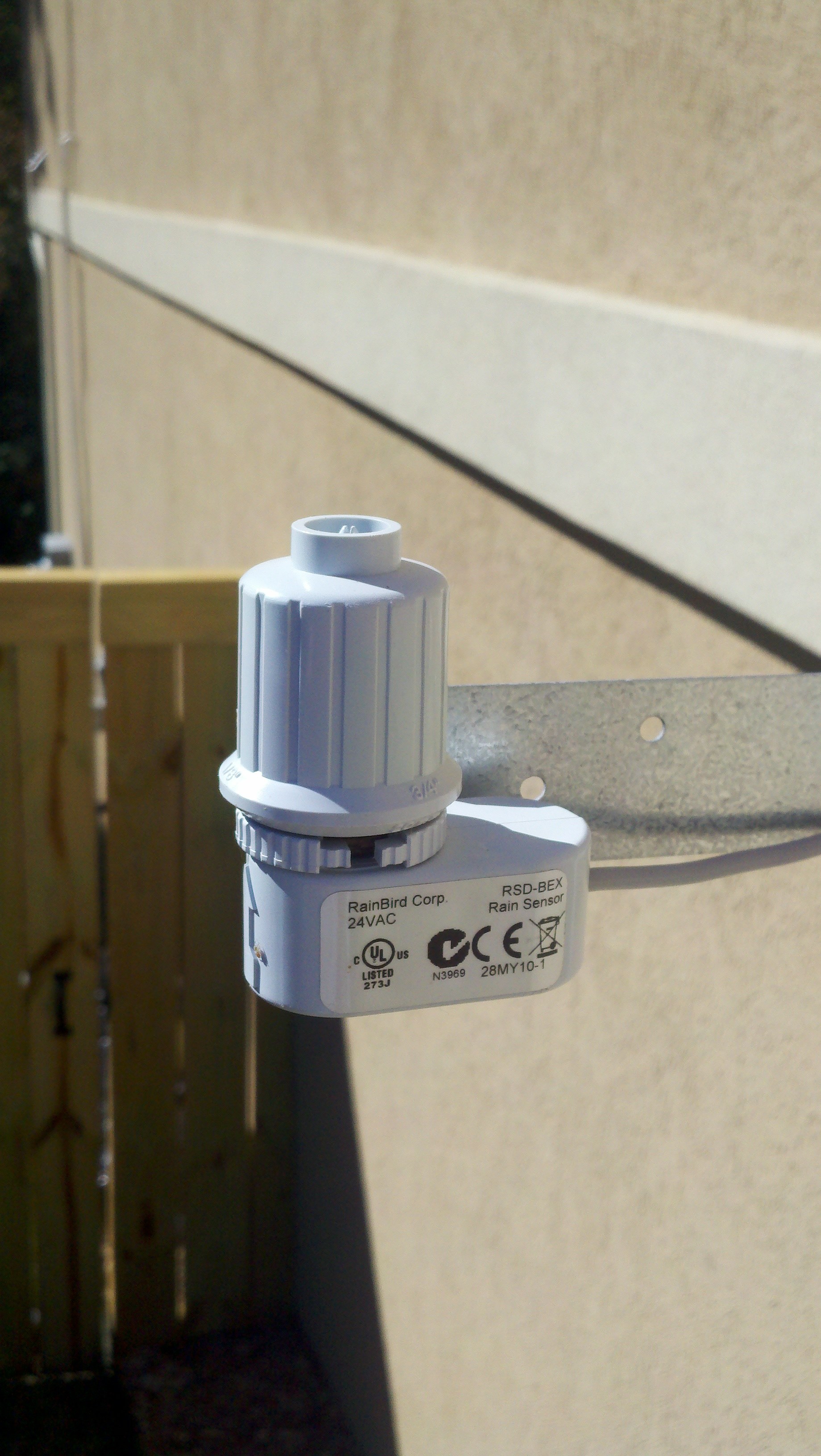 Add a Rain Gauge to Your Sprinkler System Instead of the Dishes