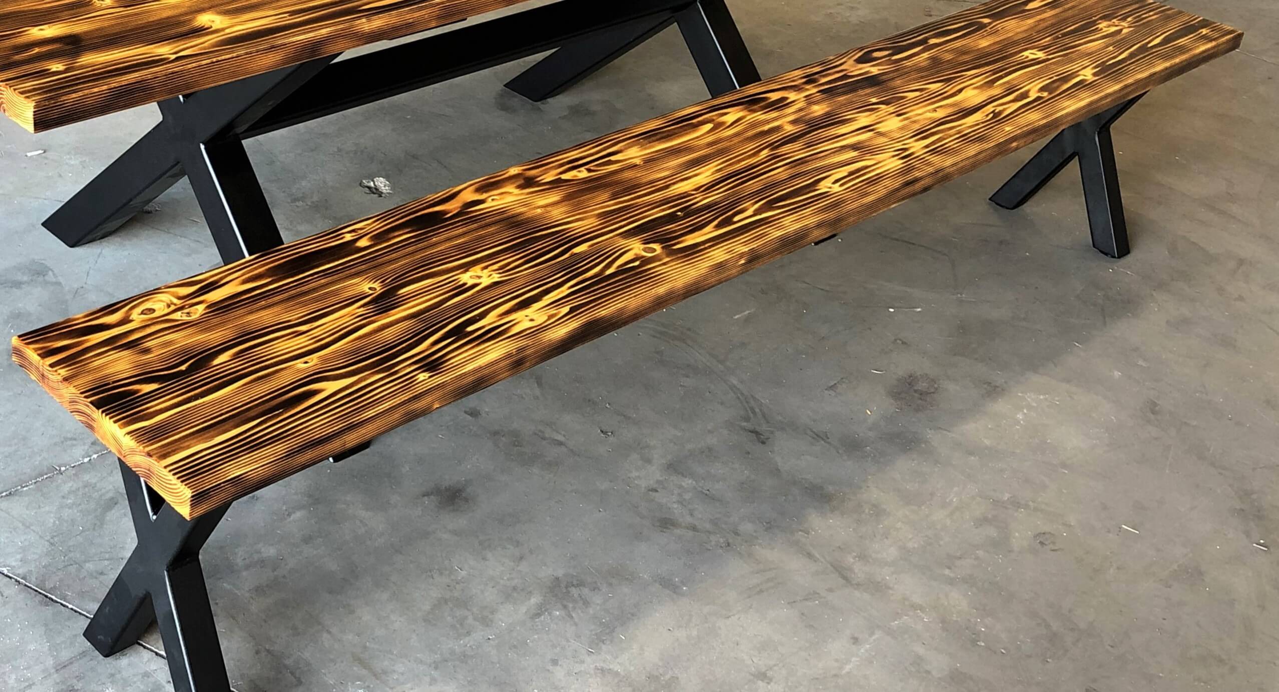 Burned Wood Bench with Steel Base Integrity Fabricators
