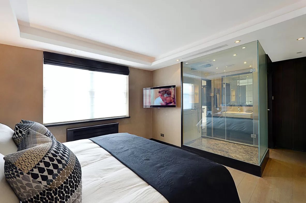 Switchable smart glass shower partition switched on clear