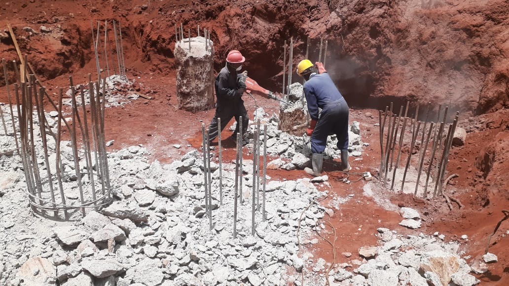 Exposing & hacking cured piles IOTA Engineering & Construction Ltd