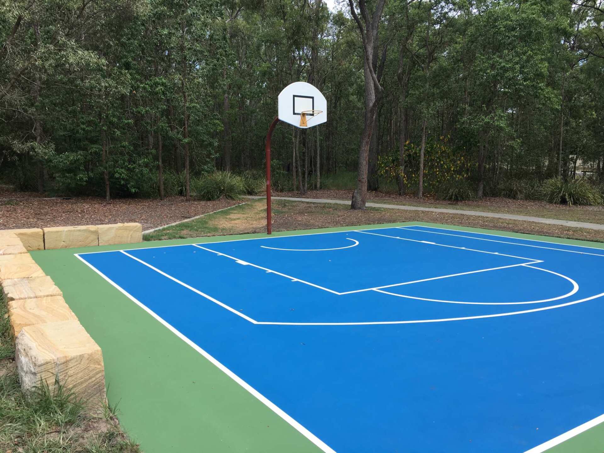 Sports surfaces for tennis courts and fields Pro One Softfall