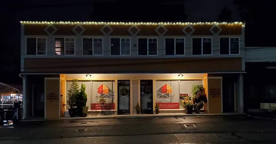 Maple Leaf Property Management At Night