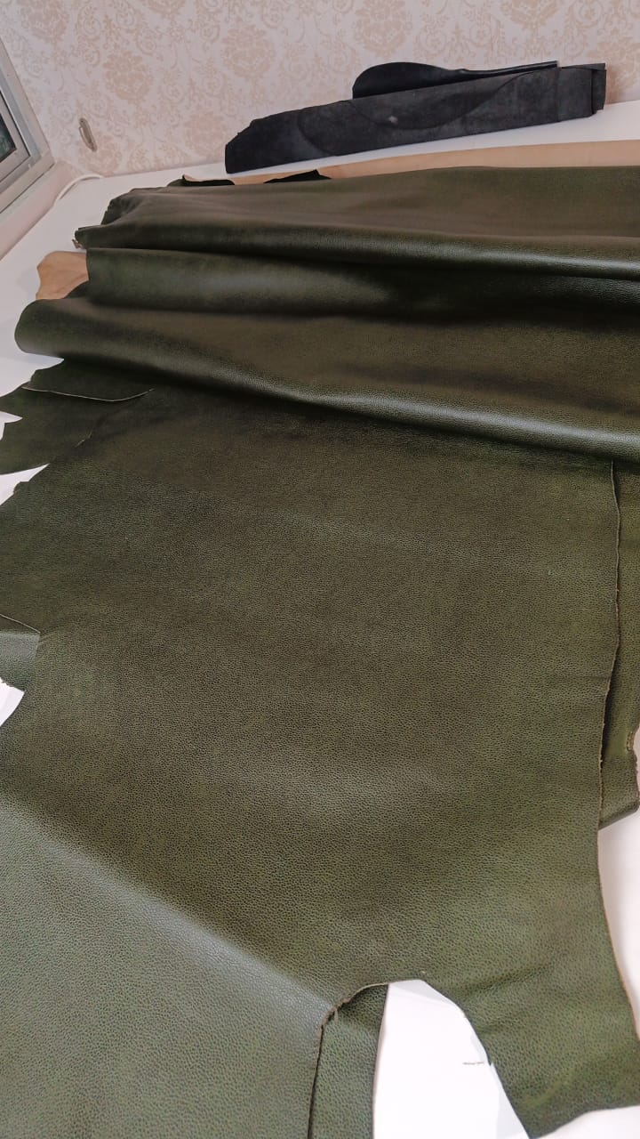 Dark Green vegetable tanned milled grain embossed cowhide leather Island Leather Supply