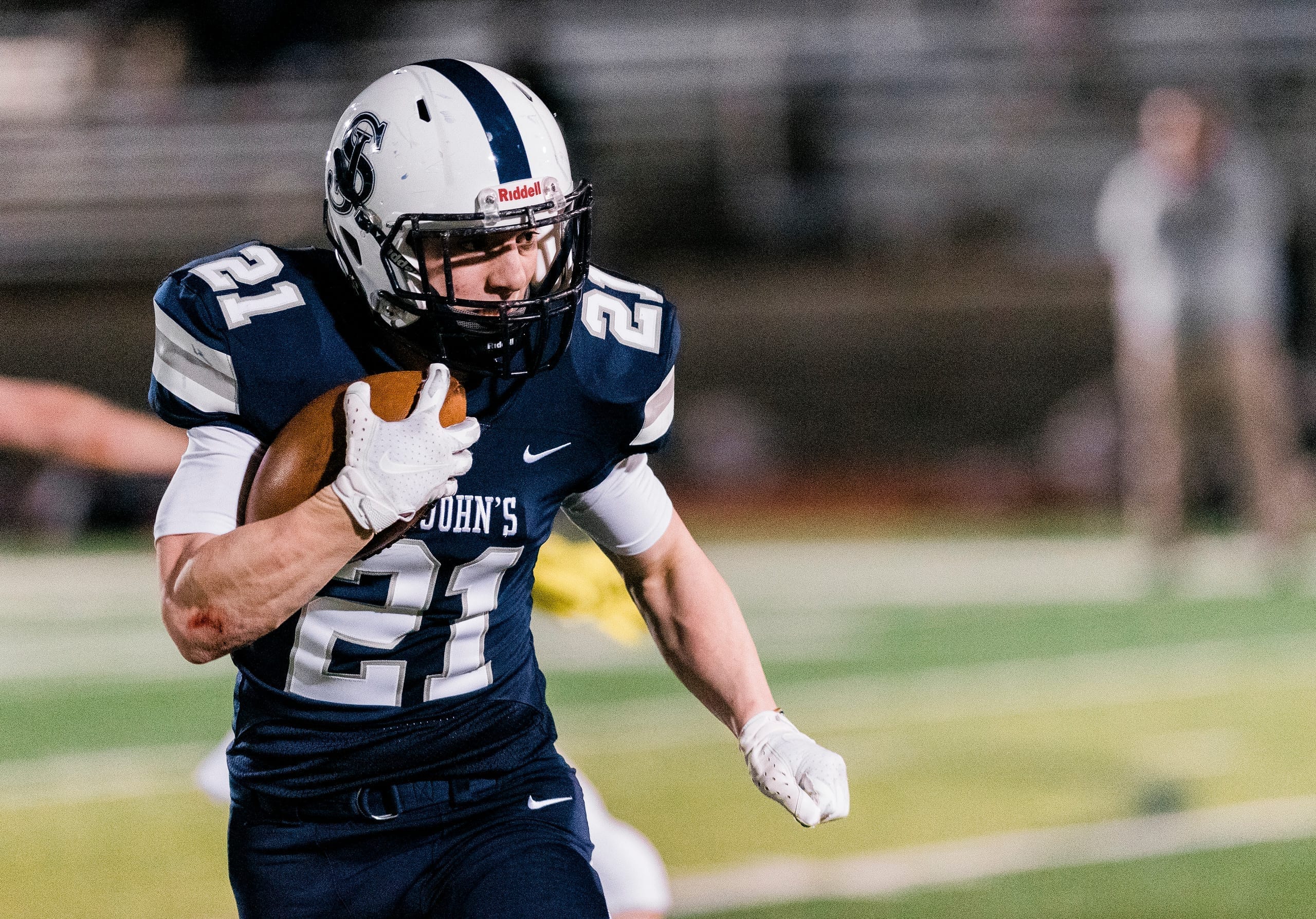 St. John's Ryan Grenier runs the ball up field. Itemlive Itemlive