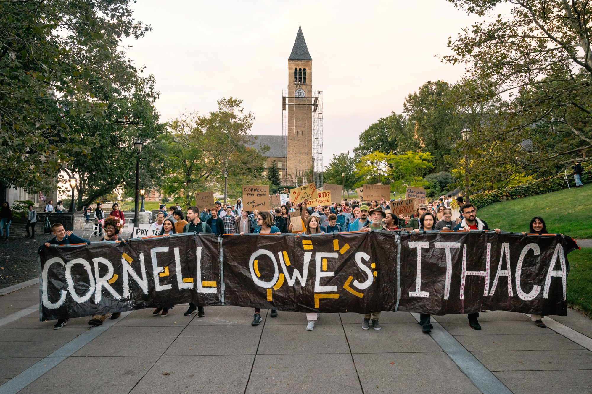 Community rallies on Cornell's campus demanding school pay Ithaca more
