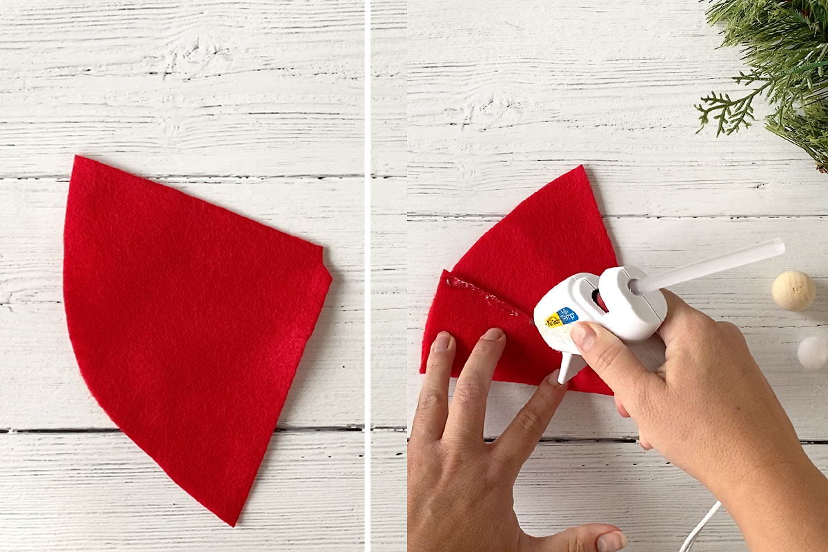 Gluing red felt into hat shape (cone)