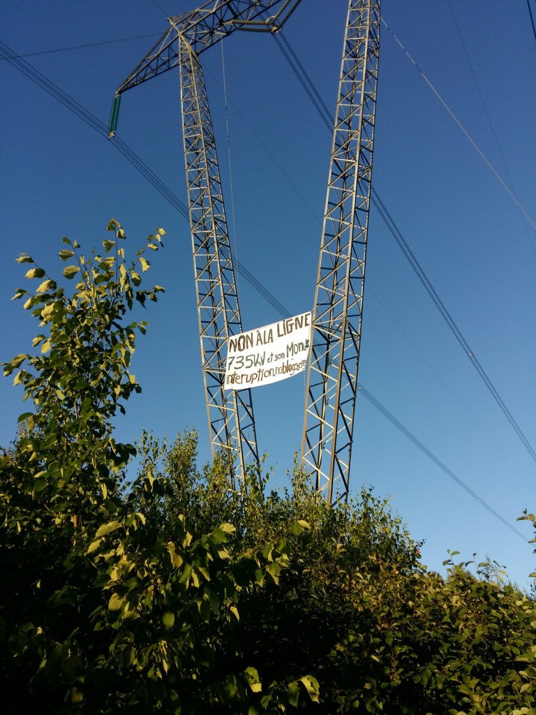 Banner Drop Against the Hydro Line and its World It's Going Down