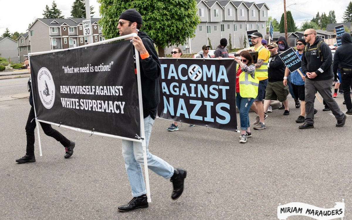 WA Community Continues to Mobilize Against NaziOwned Tattoo