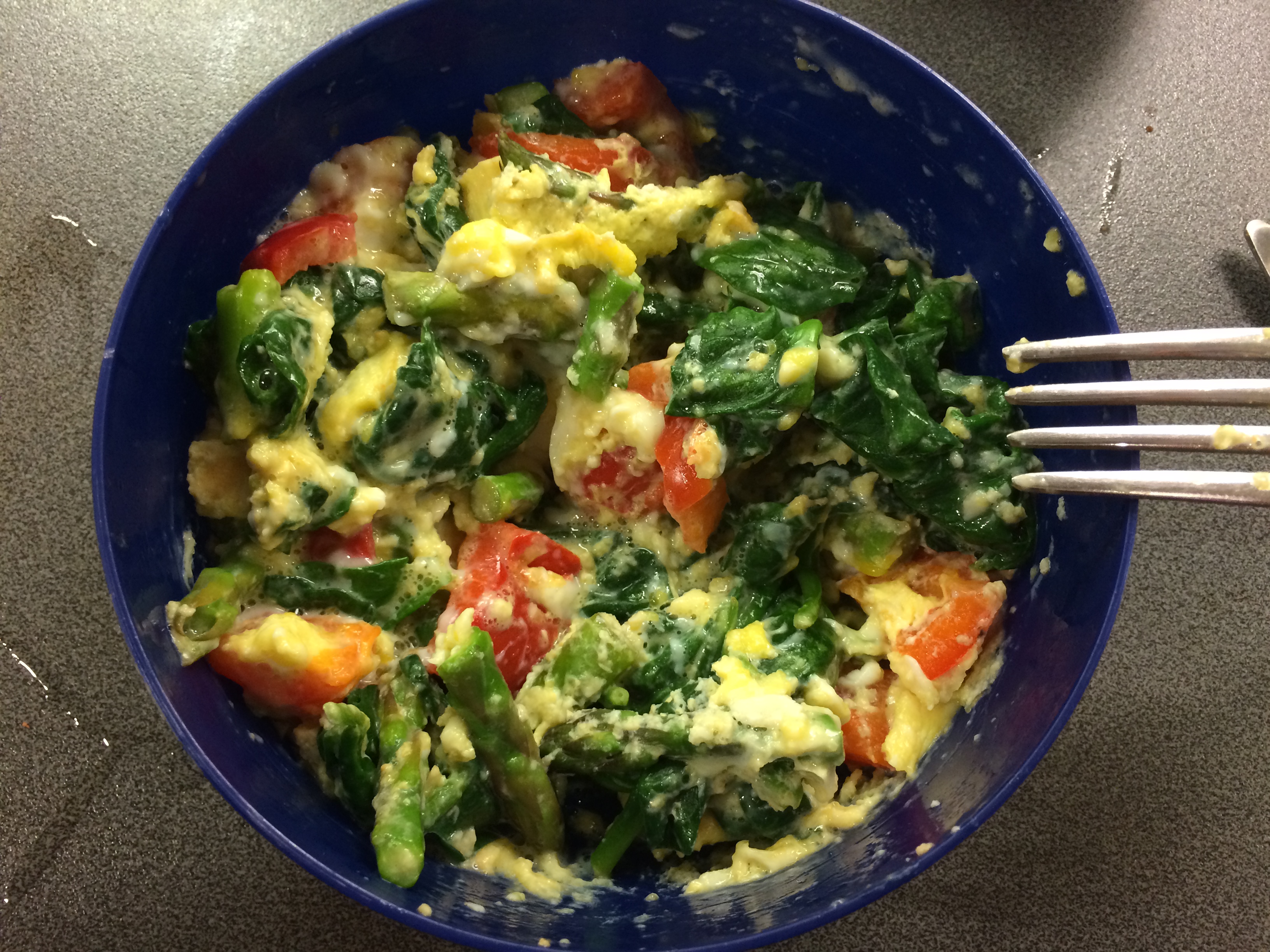 Scrambled eggs with veggies and cheese It's not easy being greedy