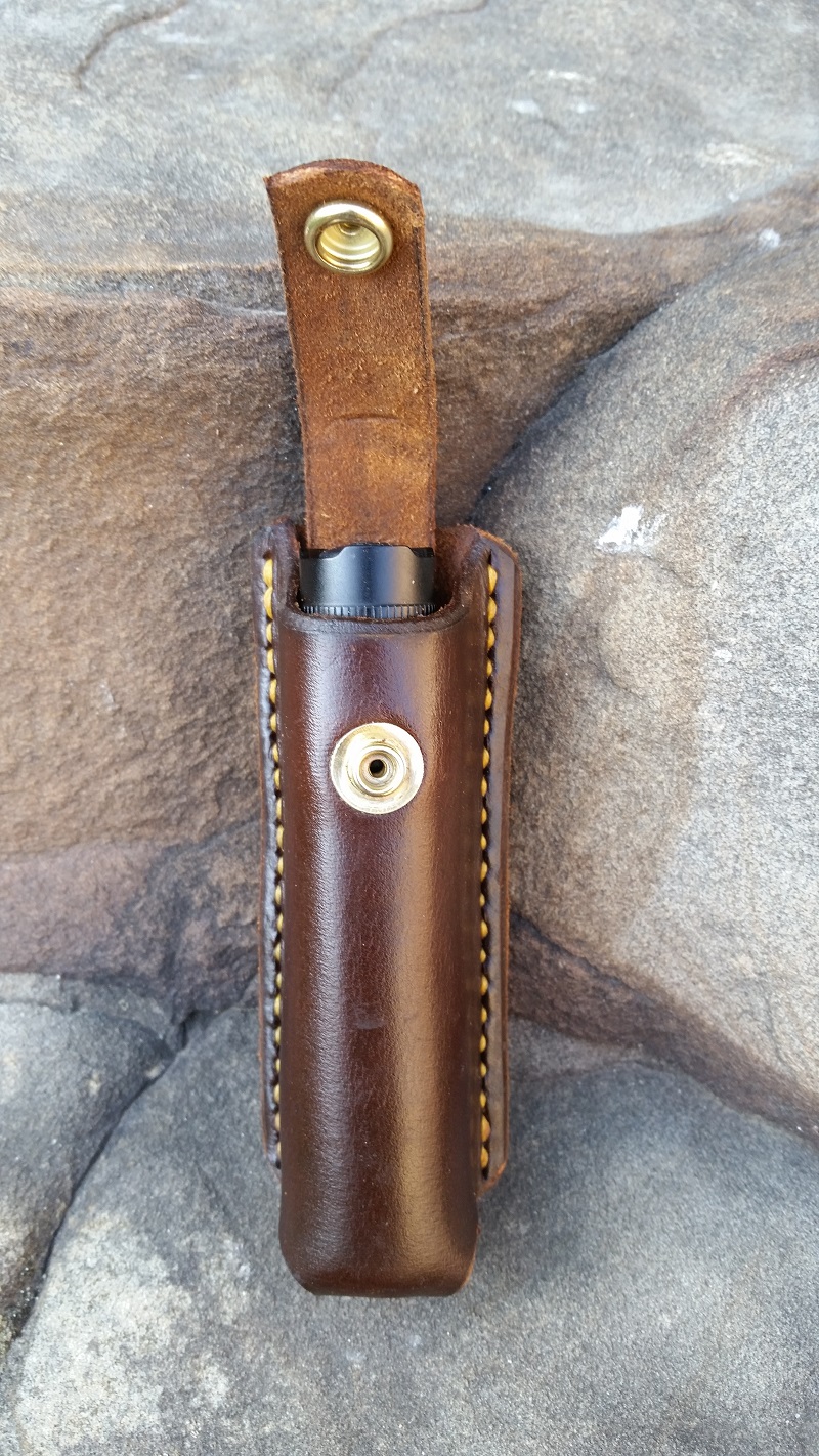 Flashlight sheath / holster Jackson LeatherWork, LLC