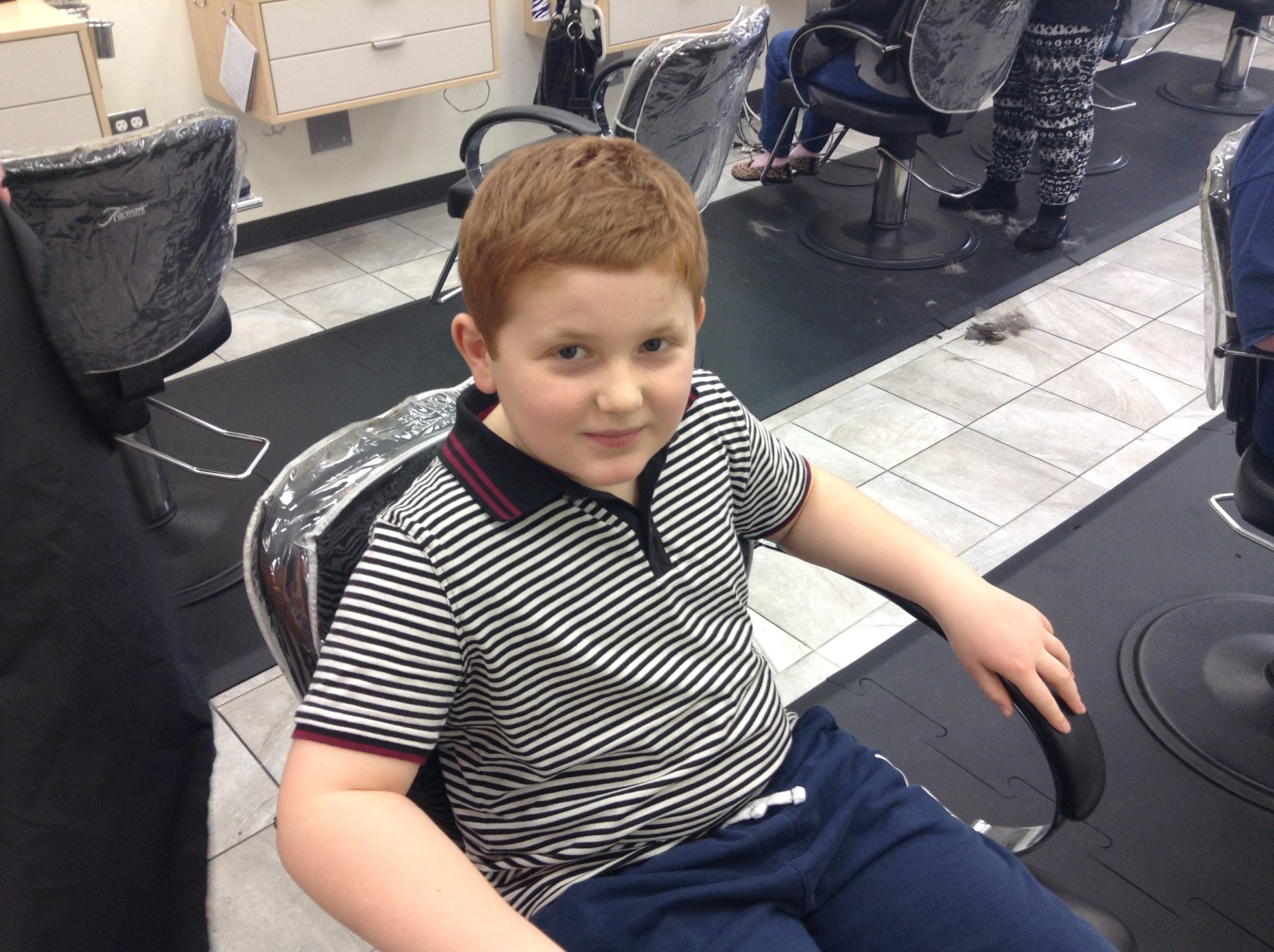 1st day of treatment is here and Jacob's having his hair cut Jacobs