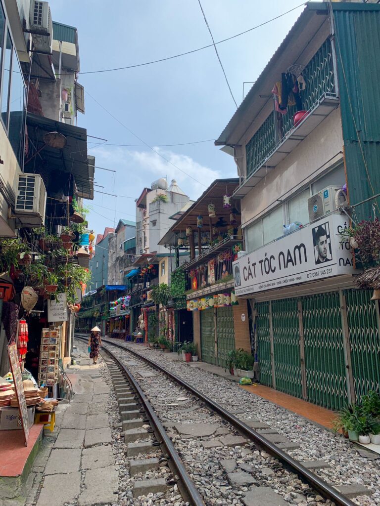 first solo budget travel, visiting the famous train street in Hanoi