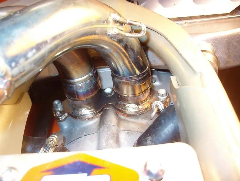 Exhaust flange was leaking and leaving soot on the cylinder, CAUSING POPPING ON DECELERATION