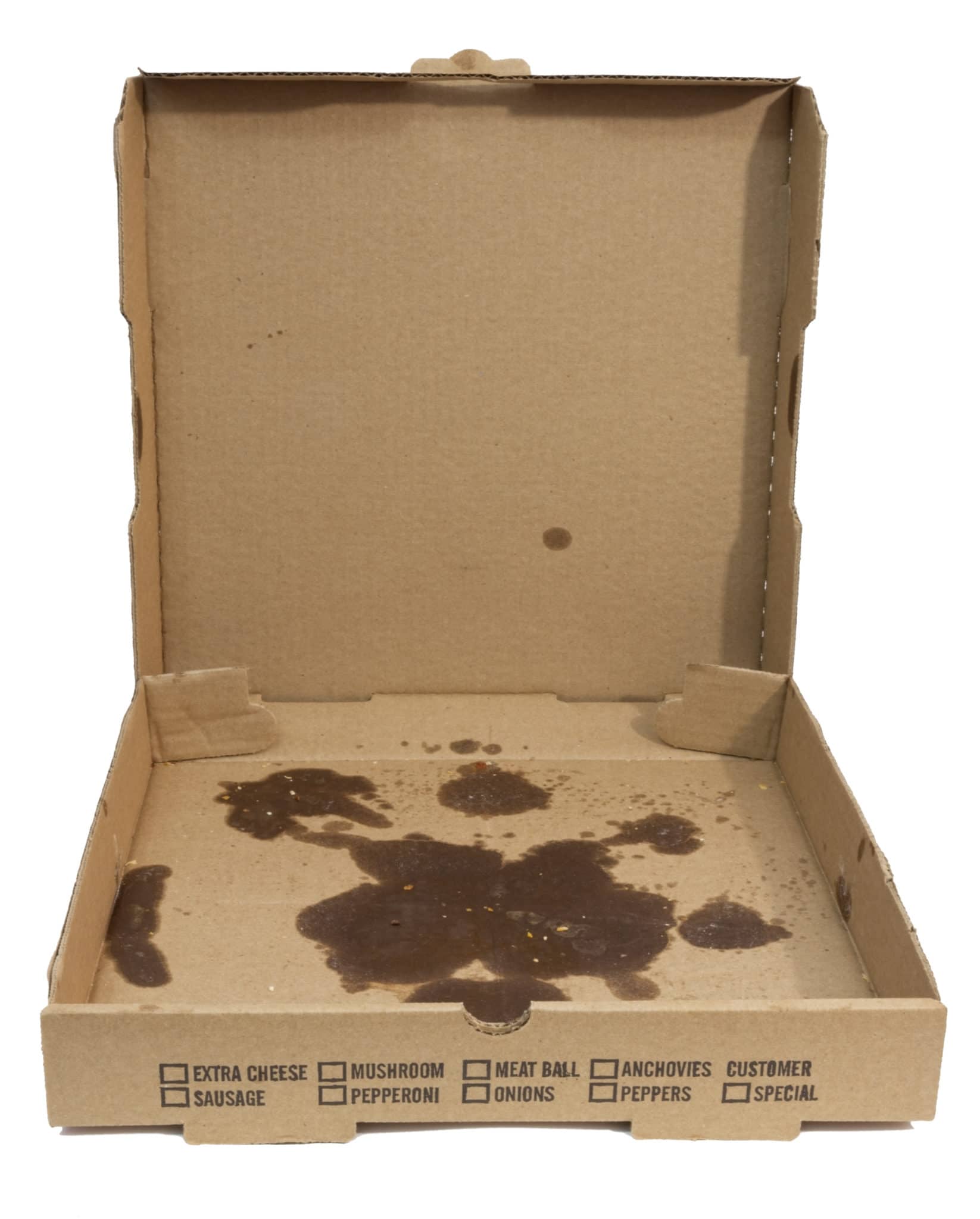 Empty greasy pizza box with lid open. Isolated. Jeffries