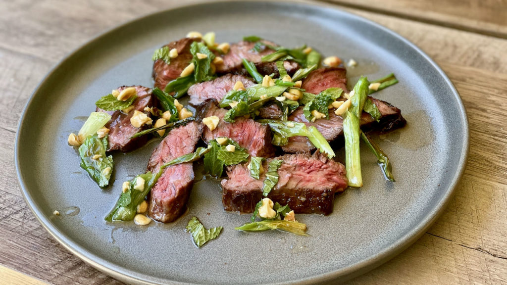 Seared hanger steak with rustic charred scallion salsa Jess Pryles