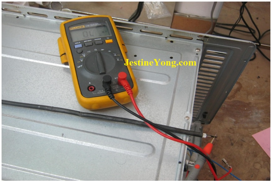 A Toaster Oven With One Of A Heating Element Not Heating Up Replaced