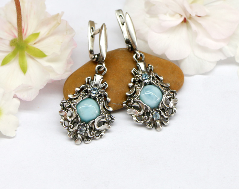 Dangle earrings with complex pattern in fantasy style. Jewelry design
