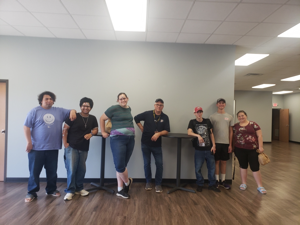 Six Guthrie Job Corps Students and the center’s Business Community