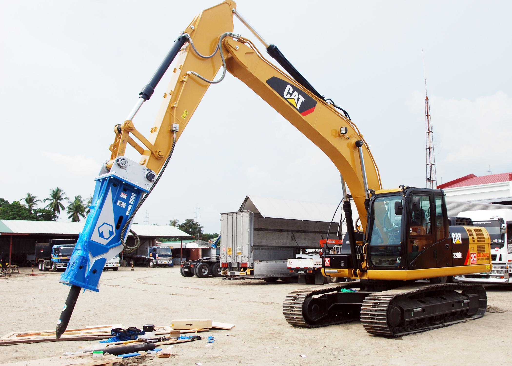 Backhoe with Breaker Joel Chavez Equipment Rentals Corporation