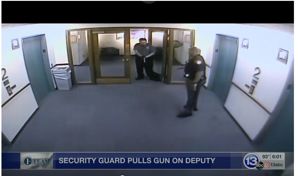 WATCH IRS Armed Guard Pulls Gun on Uniformed Sheriff's Deputy, Almost