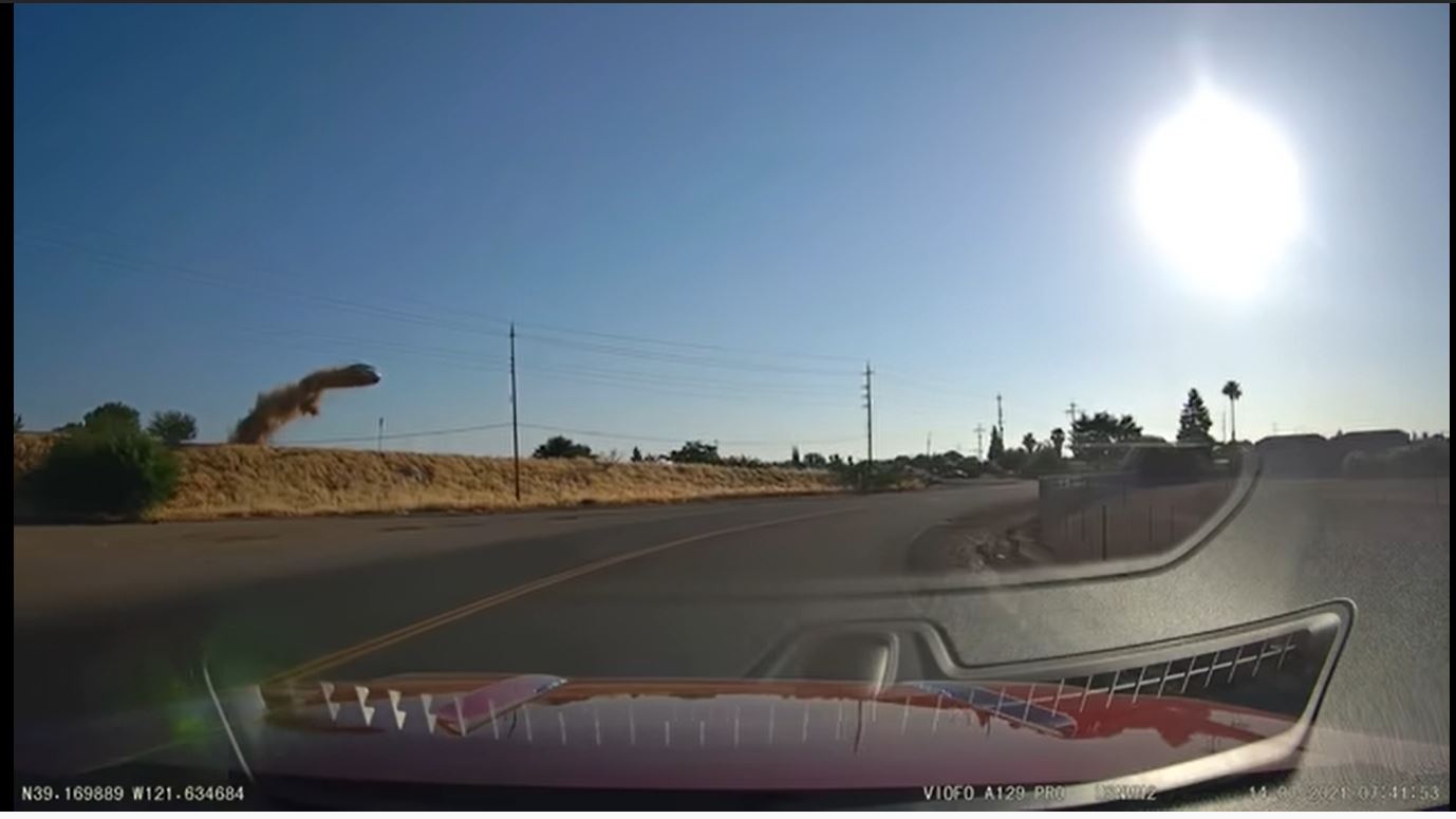 WATCH Car Jumps California Highway in Shocking Crash Caught on Camera