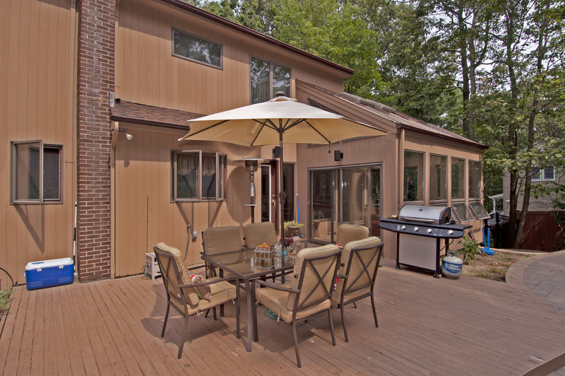 Port Jefferson Hilltop Contemporary. Mastery of Space & Sun! 569K Jolie Powell Realty Port