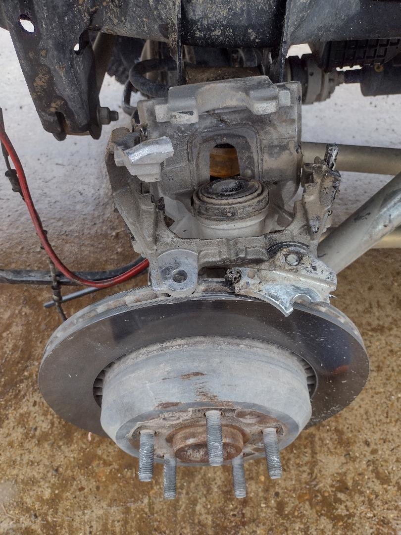JL, JLU, and JT Caliper Bracket Falling Off | Jeeps.net Forum