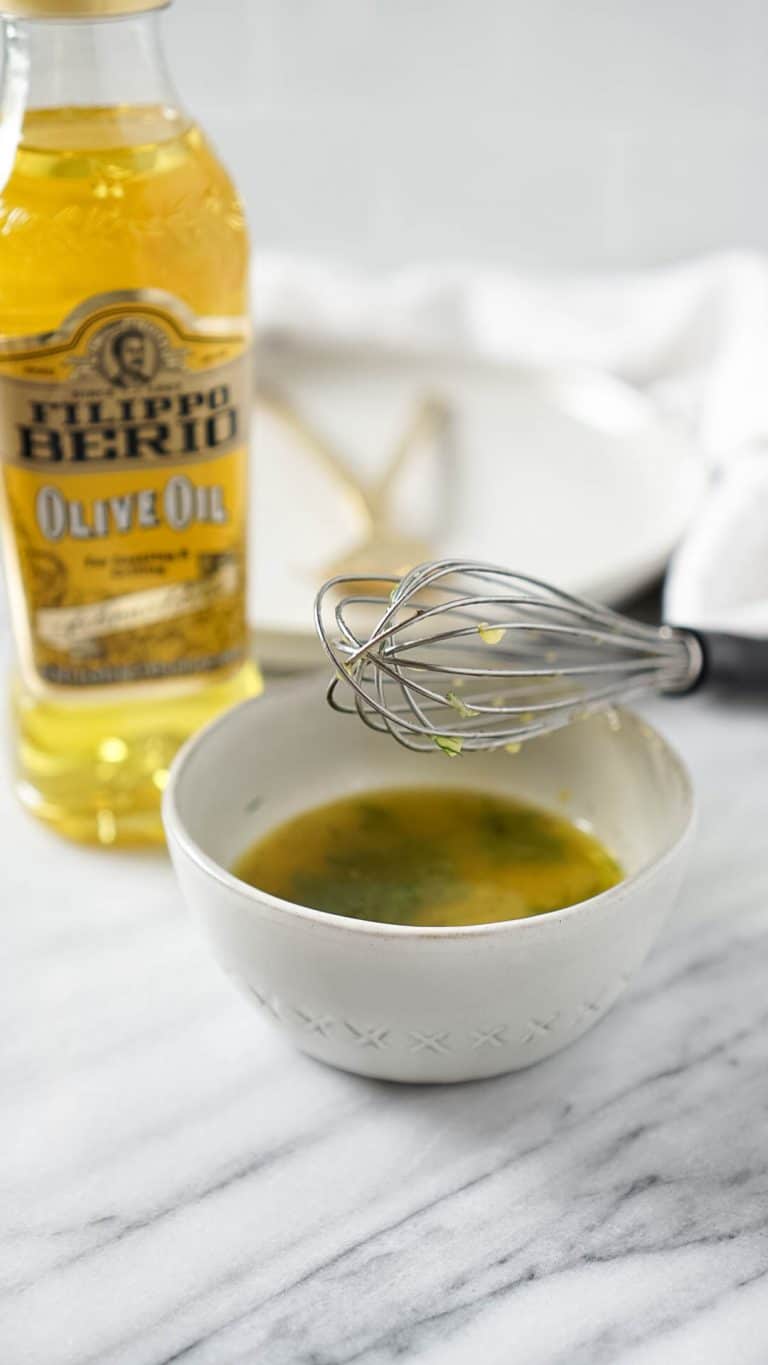 lemon vinaigrette with filippo berio olive oil and a whisk
