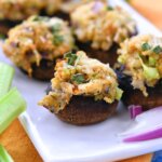 crab stuffed mushrooms on a plate