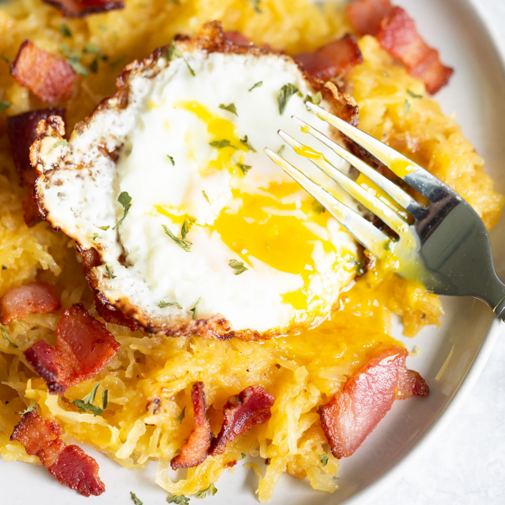 fried egg on top of spaghetti squash