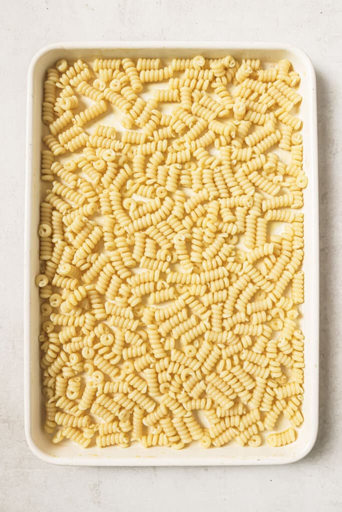 pasta on a white sheet pan