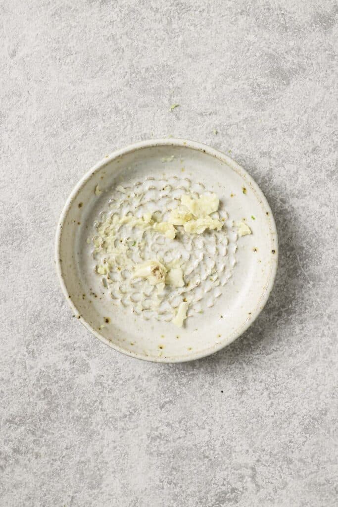 grated garlic on a plate