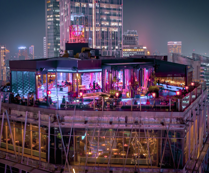 The Best Rooftop Bars in Jakarta For Food, Drink & A Dip in a Pool