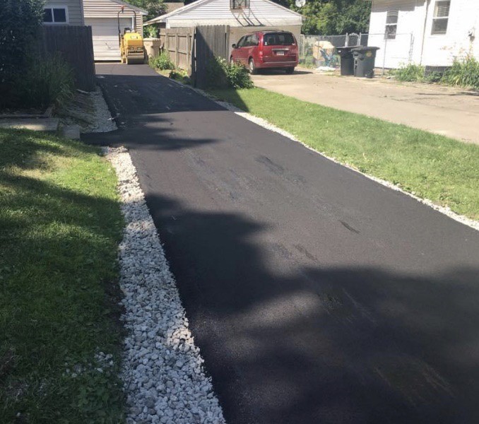 Home KanDace Wright Meriden asphalt paving, junk removal Peoria IL