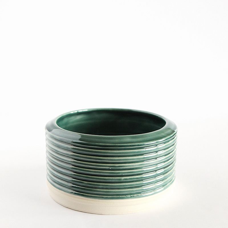 Green ribbed cylinder vase