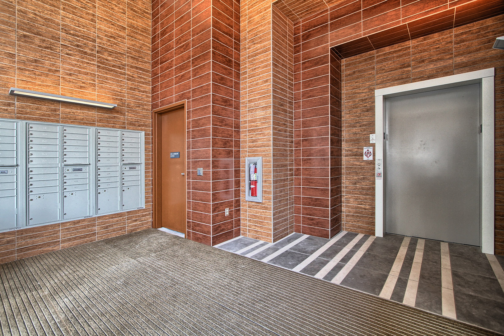 Secured entrance and private elevator for residents KD3 Design Studio