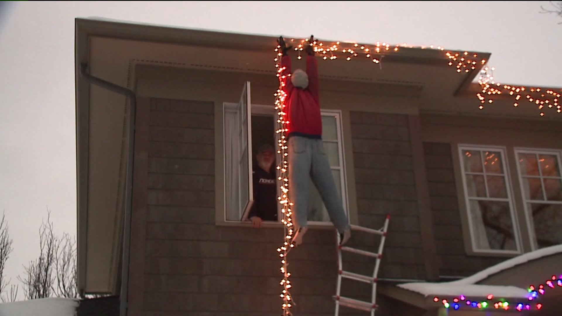 LaughOutLoud Funny guy falling off roof christmas decoration