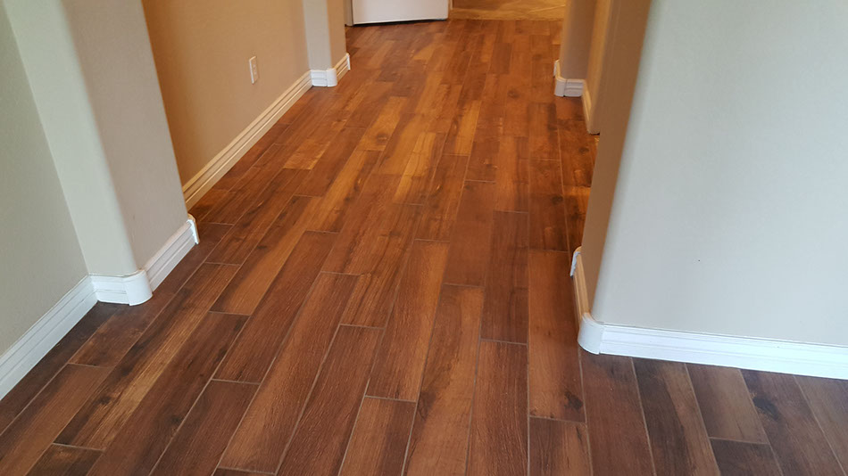 Wood look Tile vs Real Wood Kennedy Tile LLC