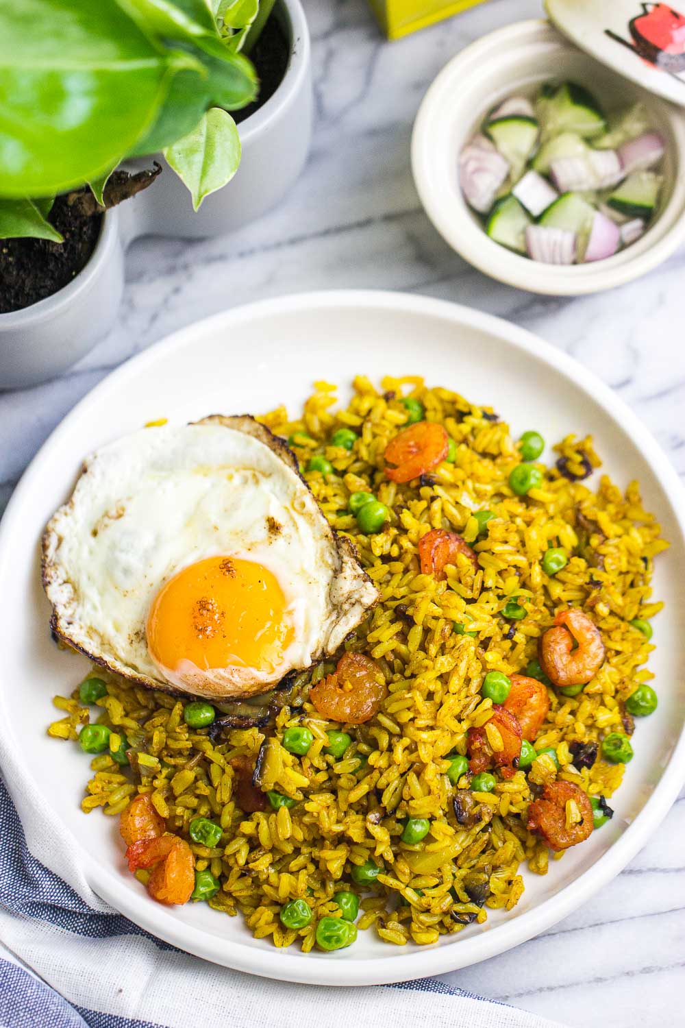 Learn how to make turmeric fried rice—it’s a simple and satisfying dinner!