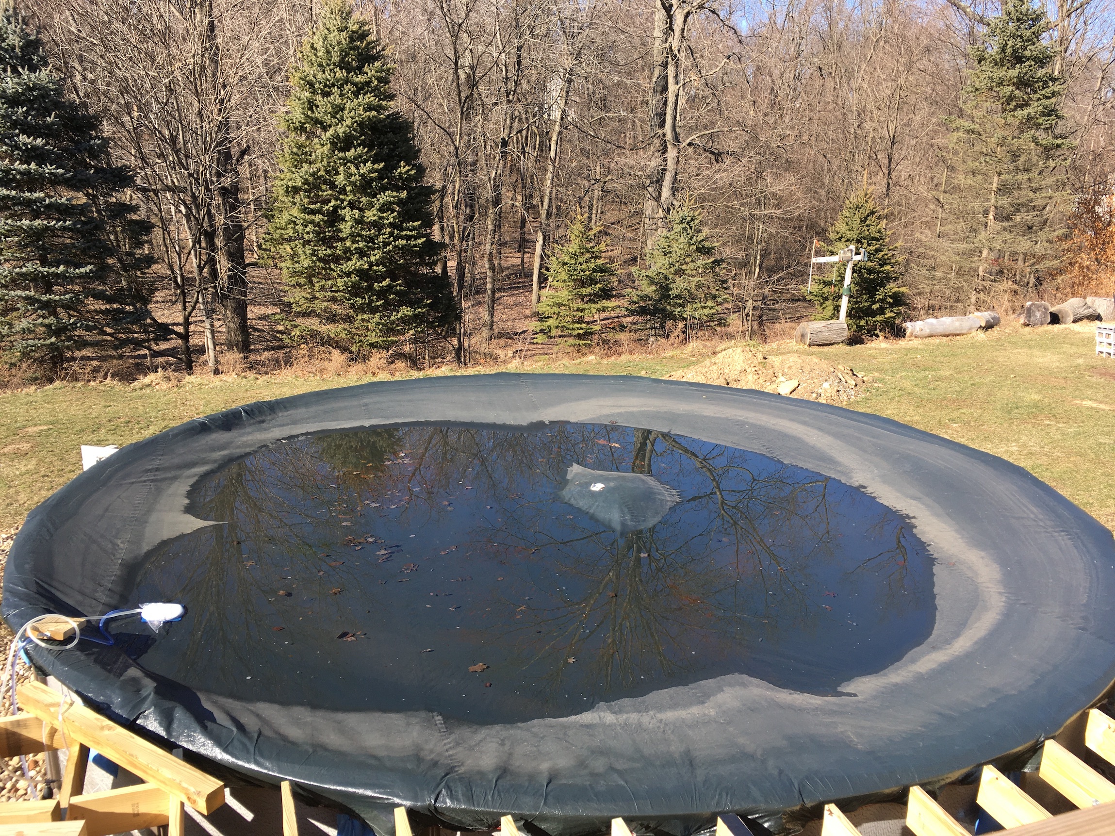 Draining a Pool Cover with a Shaker Siphon
