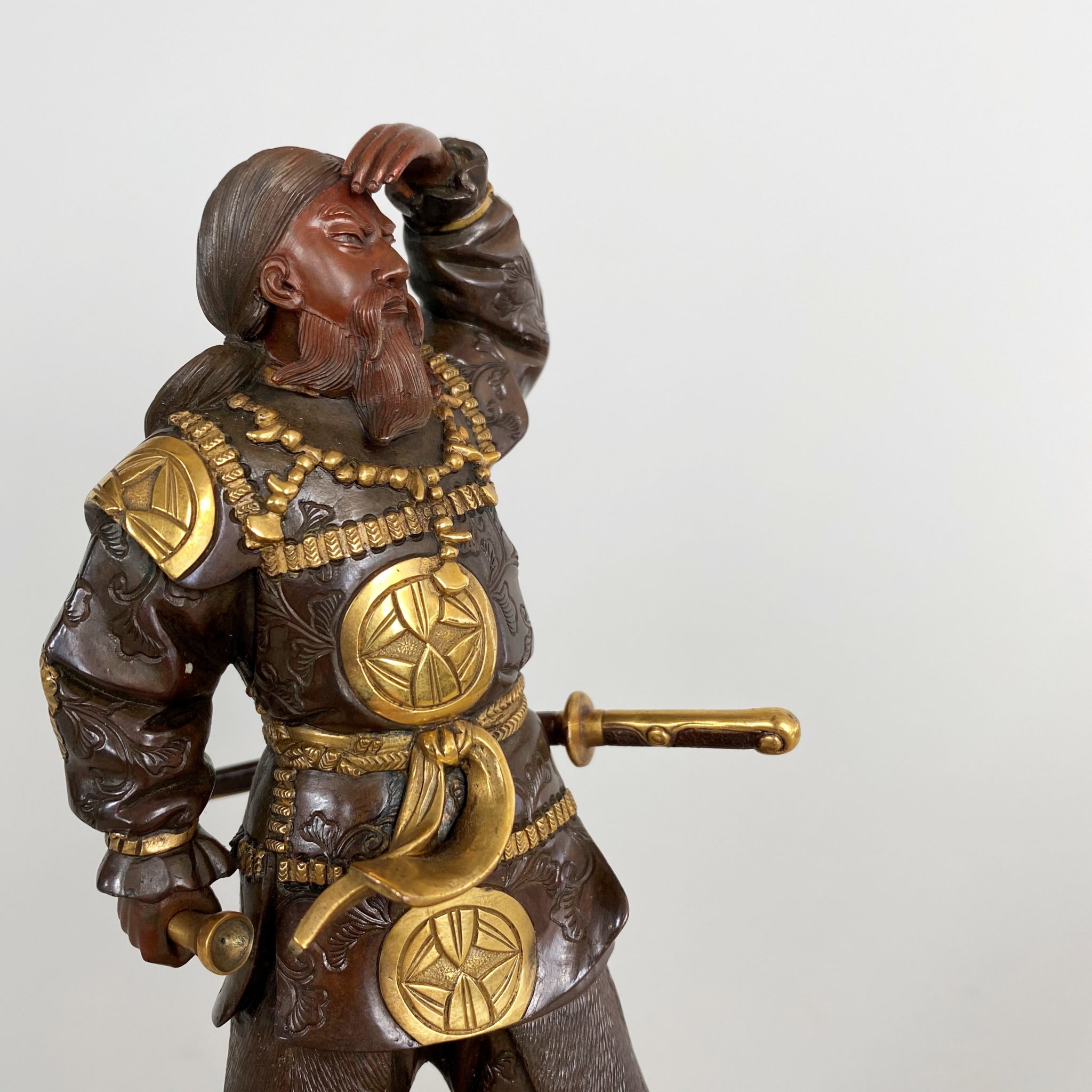 A wonderful 19th Century Miyao, Bronze and gilded statue of a Samurai