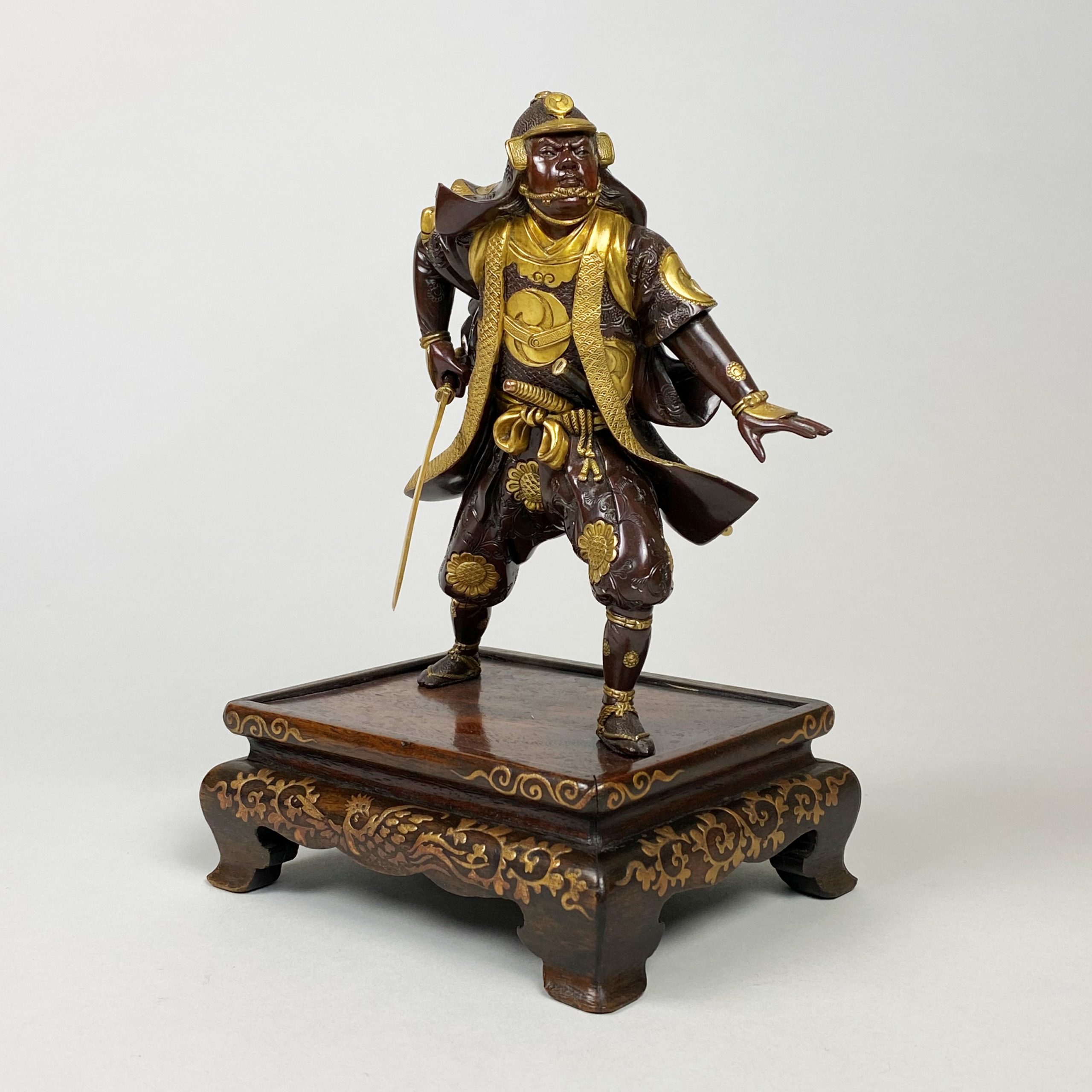 A miniature bronze miyao statue of a samurai Kevin Page
